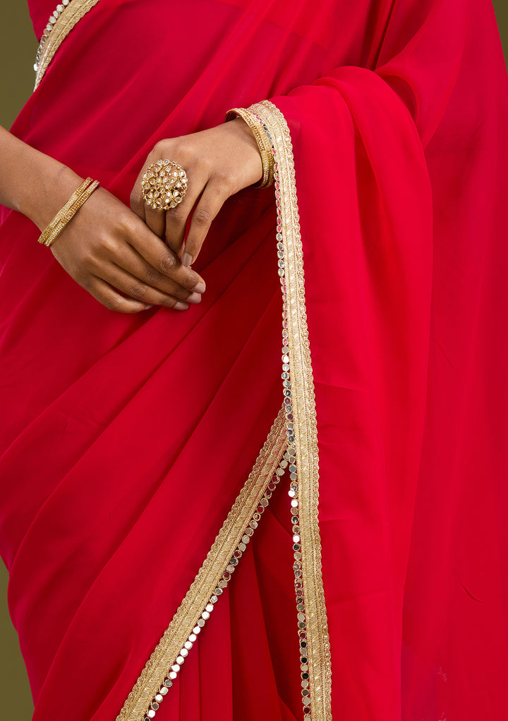 Rani Pink Georgette Mirrorwork Saree With Matching Blouse Piece