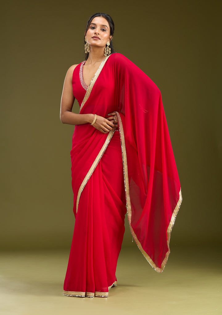 Rani Pink Georgette Mirrorwork Saree With Matching Blouse Piece