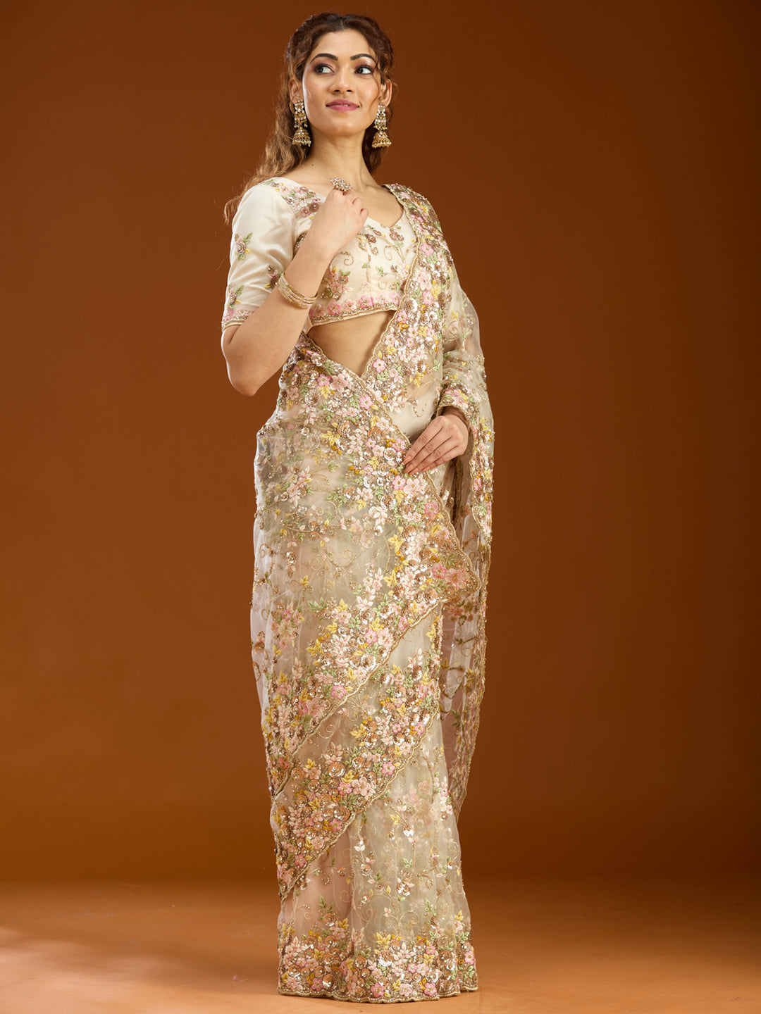 Cream Net Sequins Saree With Matching Blouse Piece