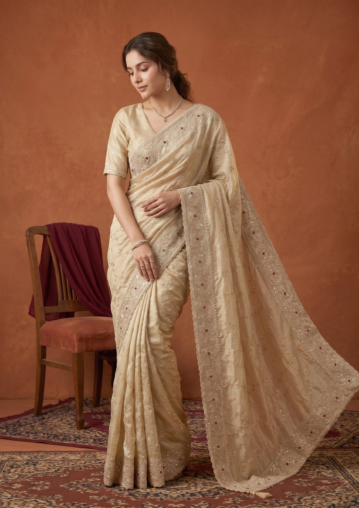 Beige Tissue Sequins Saree With Matching Blouse Piece
