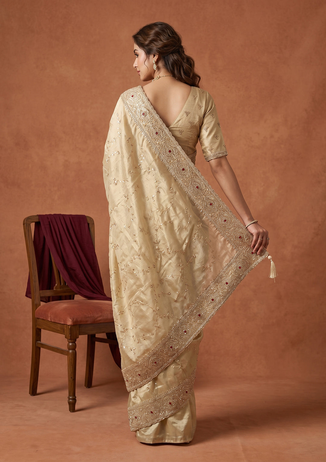 Beige Tissue Sequins Saree With Matching Blouse Piece