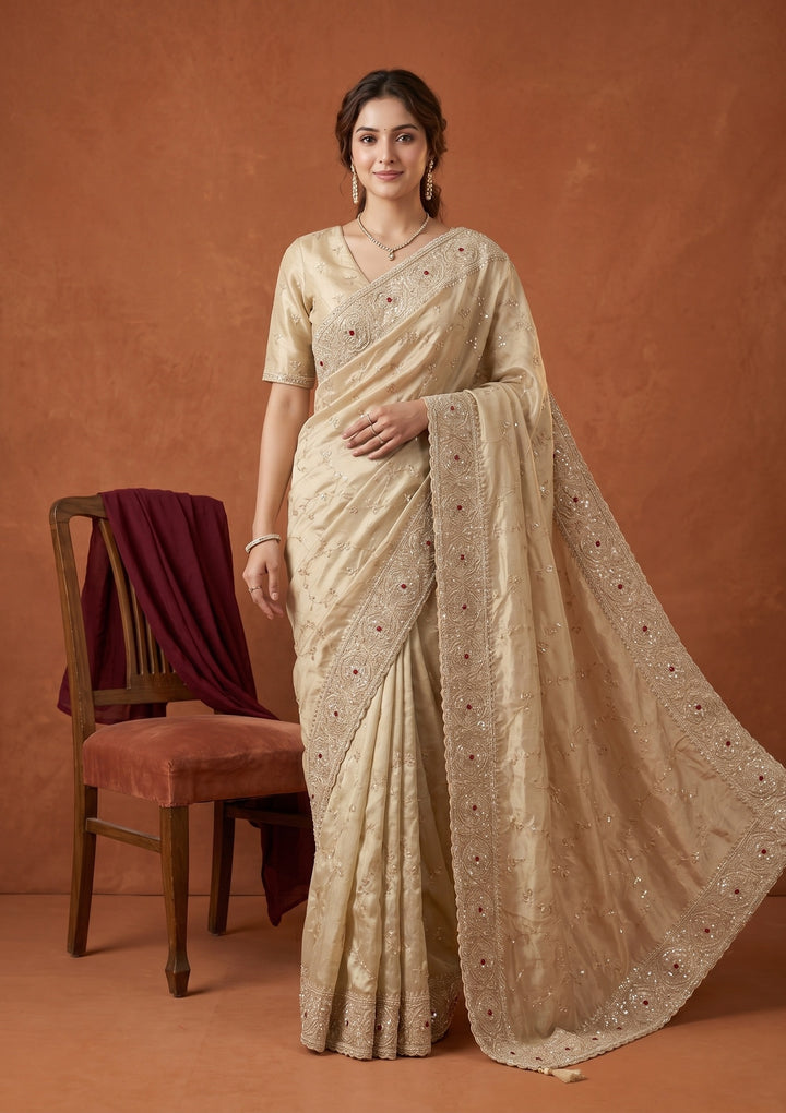 Beige Tissue Sequins Saree With Matching Blouse Piece