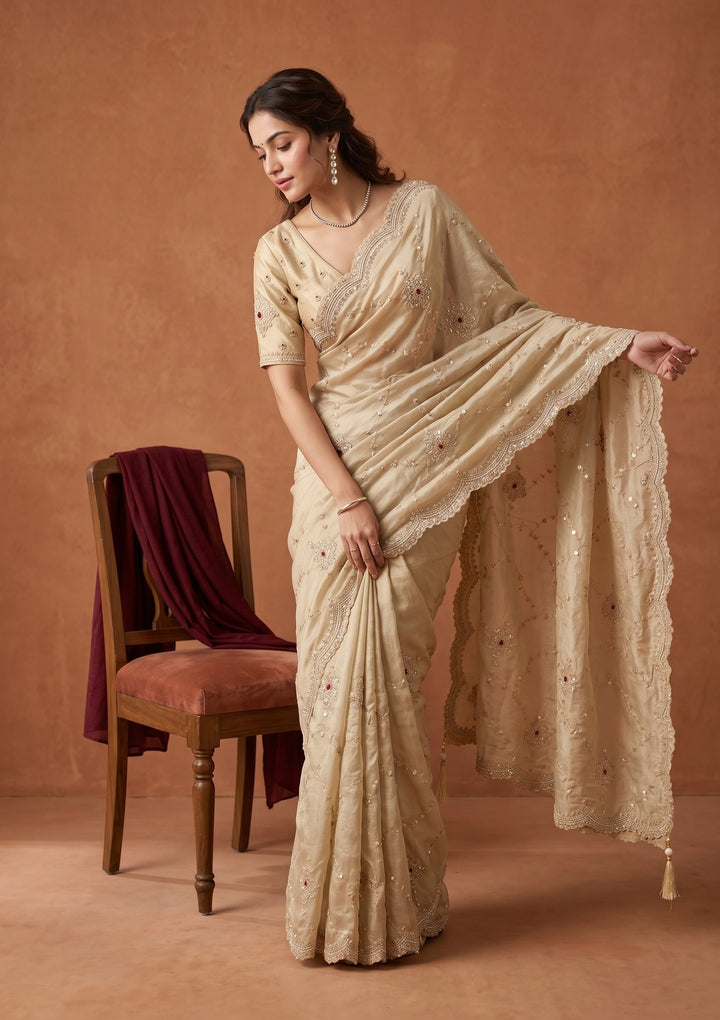 Beige Tissue Sequins Saree With Matching Blouse Piece