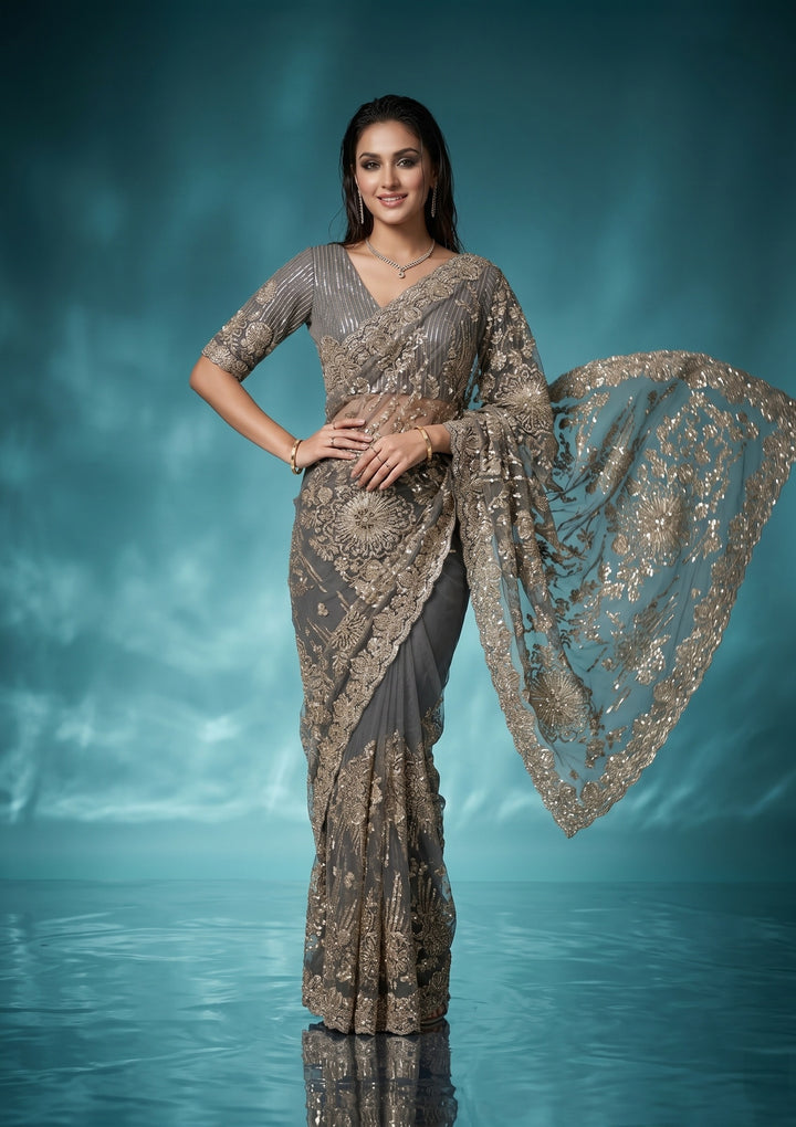 Sea Green Net Sequins Saree With Matching Blouse Piece