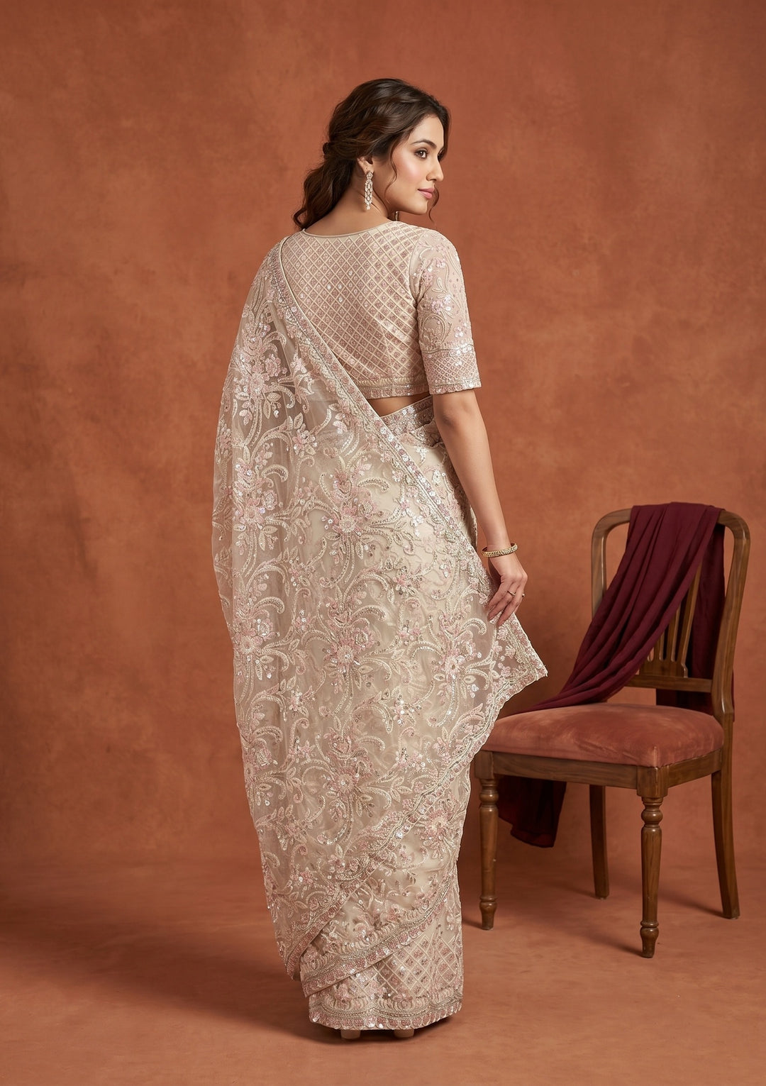 Cream Net Sequins Saree With Matching Blouse Piece