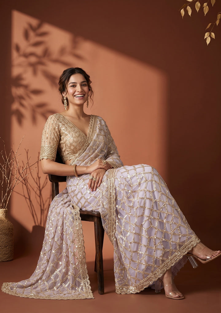 Lavender Net Sequins Saree With Matching Blouse Piece