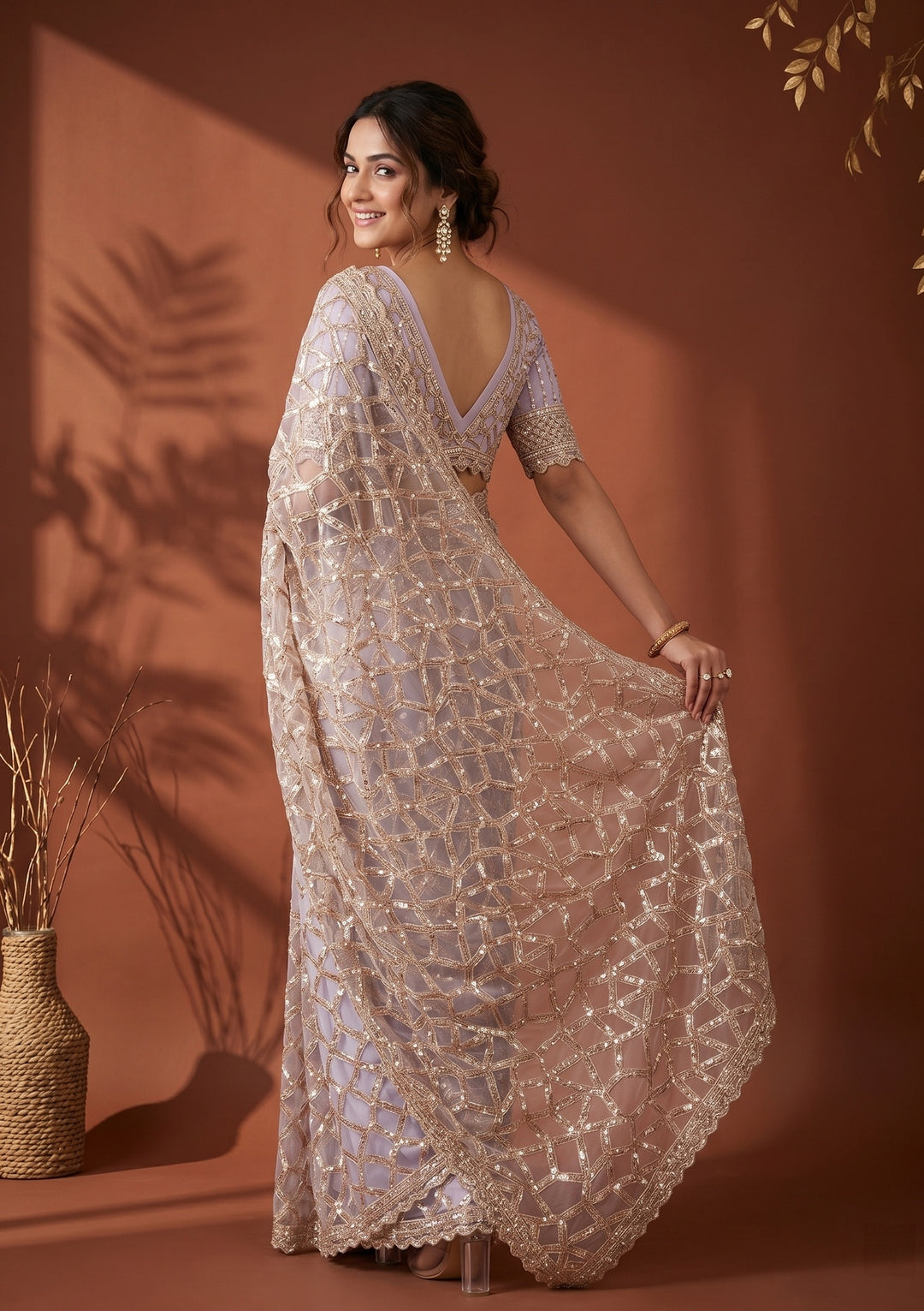 Lavender Net Sequins Saree With Matching Blouse Piece