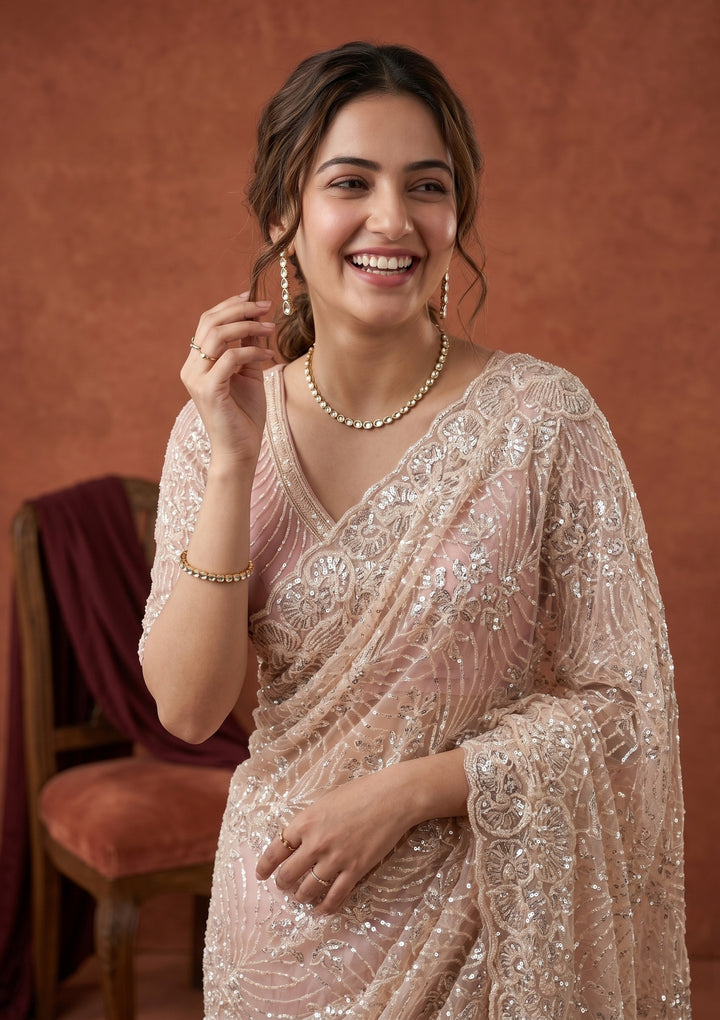 Baby Pink Net Sequins Saree With Matching Blouse Piece