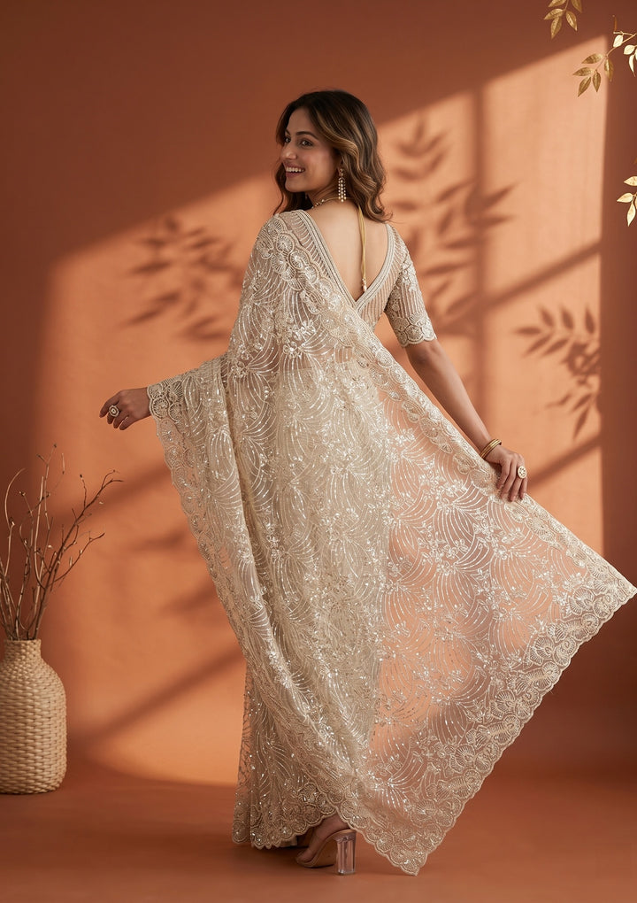 Cream Net Sequins Saree With Matching Blouse Piece