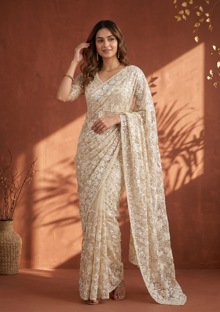 Cream Net Threadwork Saree With Matching Blouse Piece