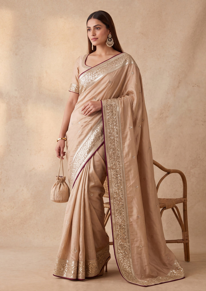 Beige Crepe Sequins Saree With Matching Blouse Piece