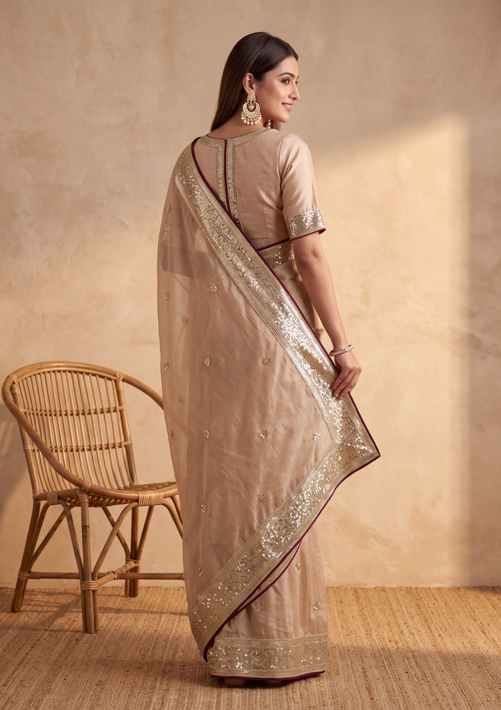 Beige Crepe Sequins Saree With Matching Blouse Piece