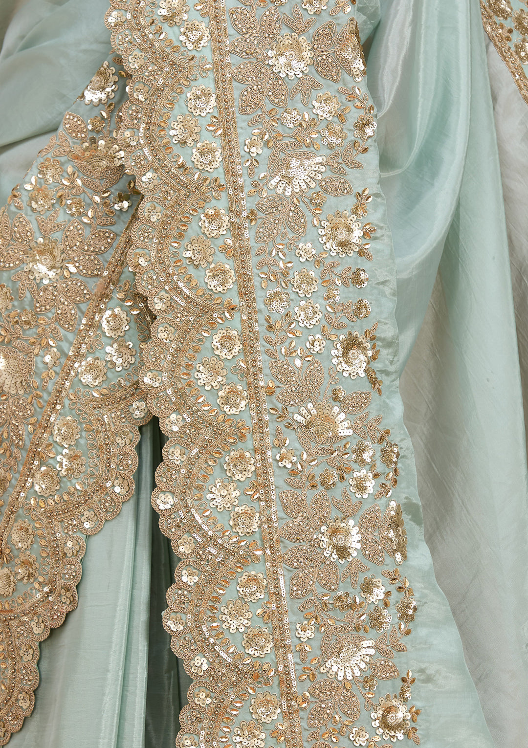 Sea Green Tissue Sequins Saree With Matching Blouse Piece