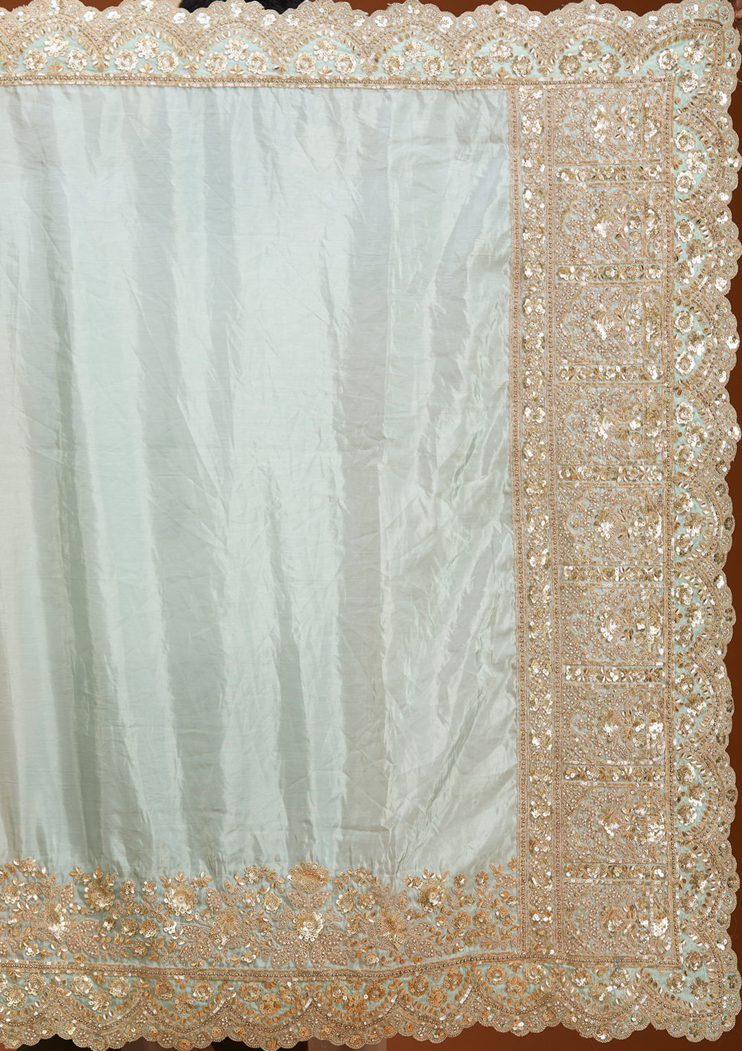 Sea Green Tissue Sequins Saree With Matching Blouse Piece