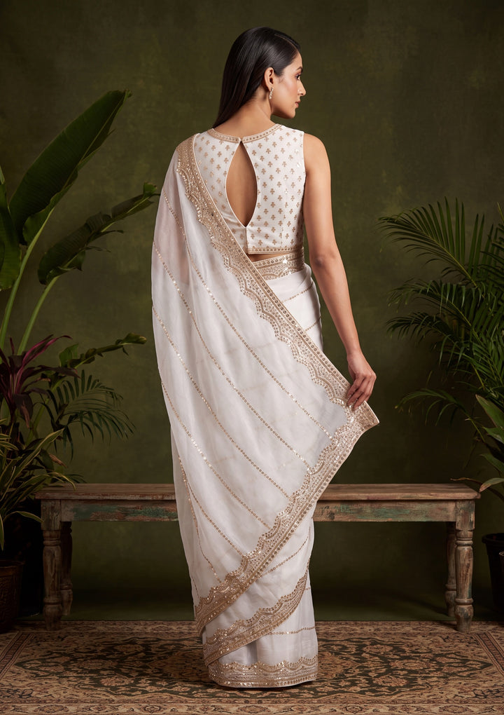 Off White Zariwork (Gold) Tissue Saree With Matching Blouse Piece