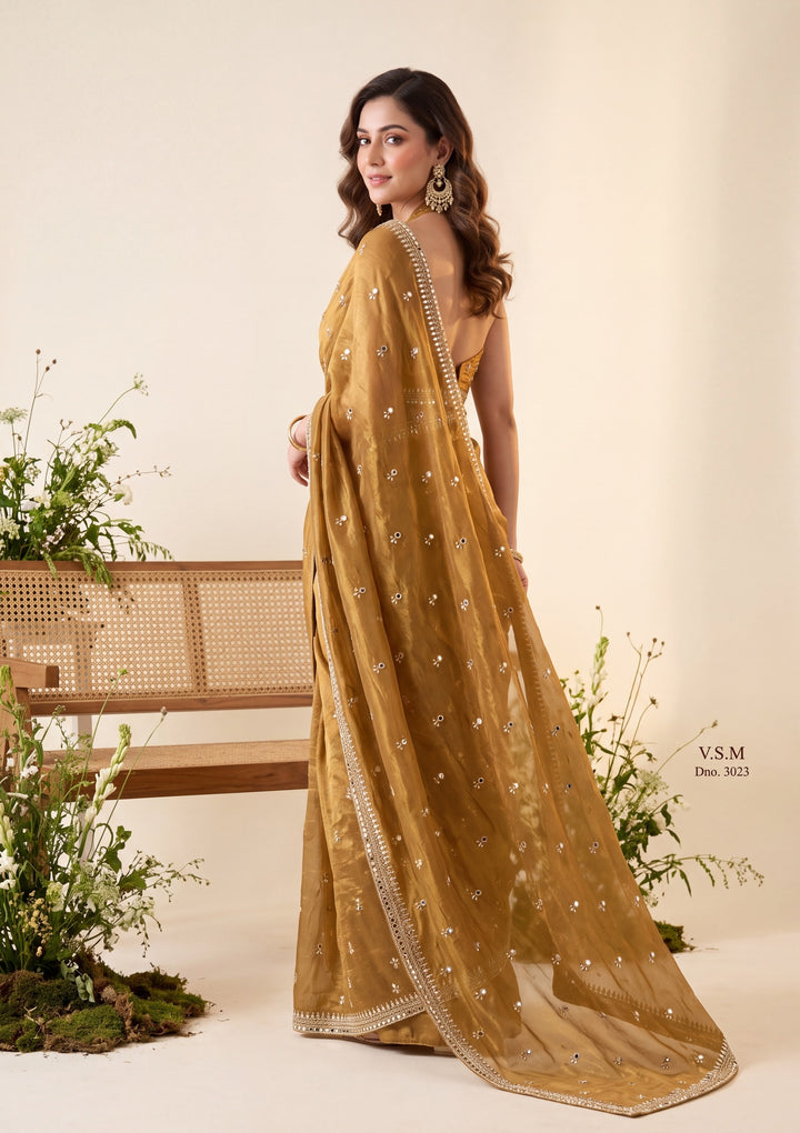 Mustard Yellow Tissue Cutdana Saree With Matching Blouse Piece