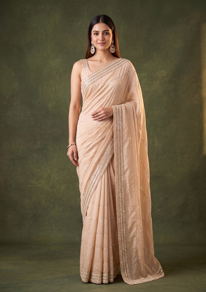 Beige Crepe Sequins Saree With Matching Blouse Piece