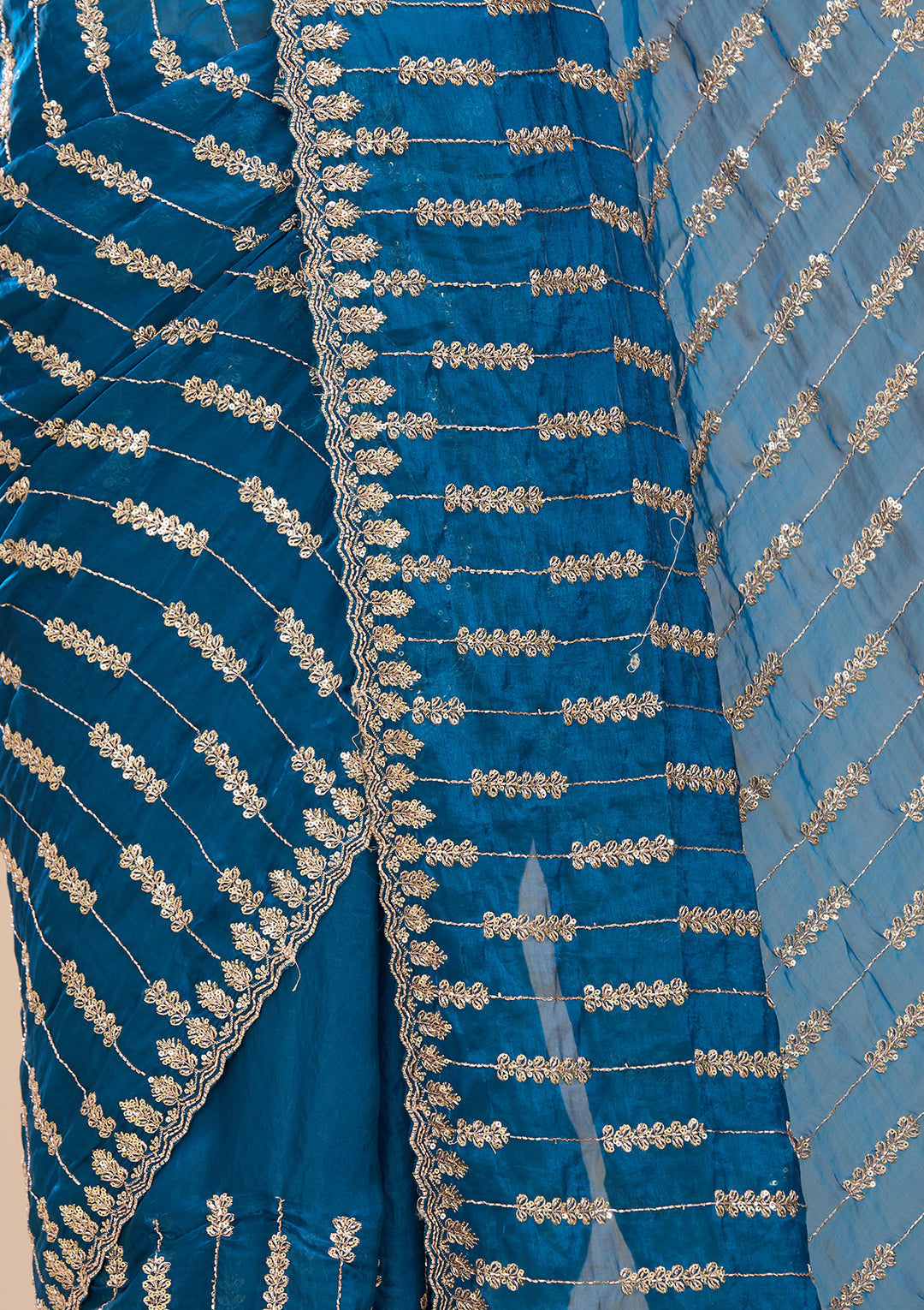 Peacock Blue Tissue Sequins Saree With Matching Blouse Piece