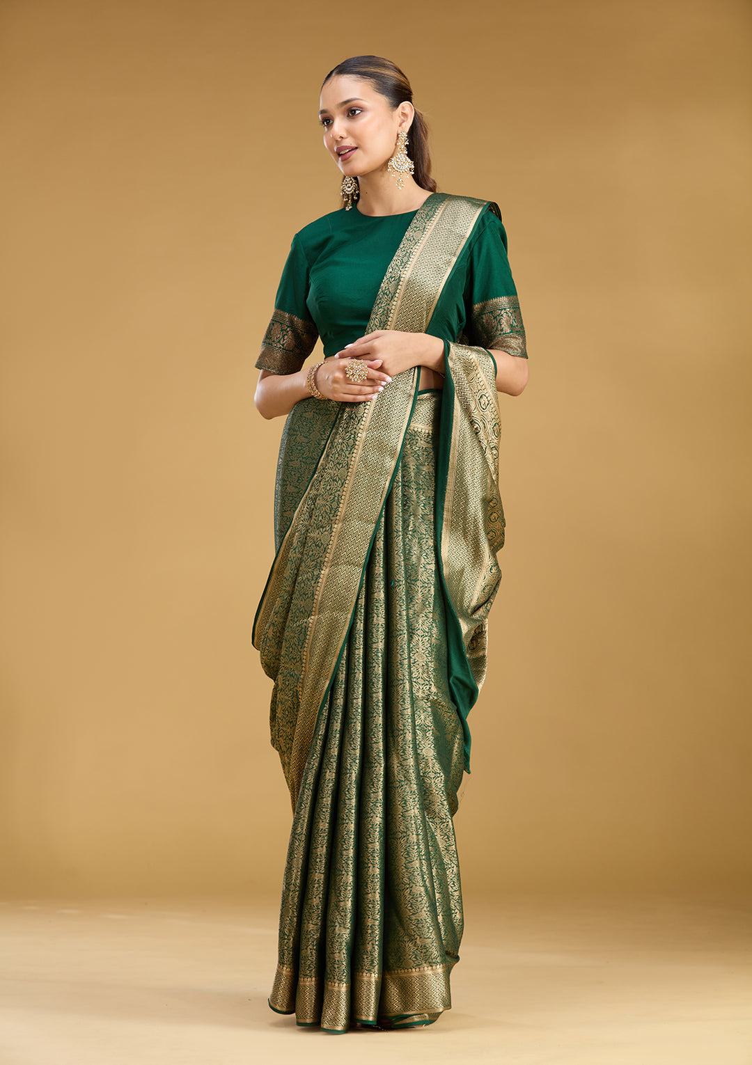 Bottle Green Georgette Jaal Gold Zariwork Saree With Matching Blouse Piece