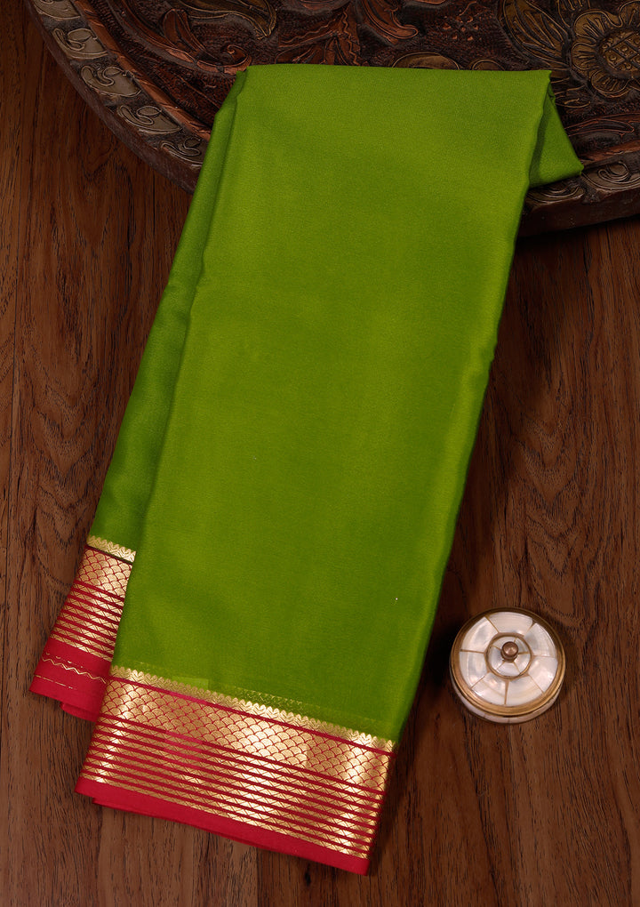 Parrot Green Crepe Plain Saree With Matching Blouse Piece