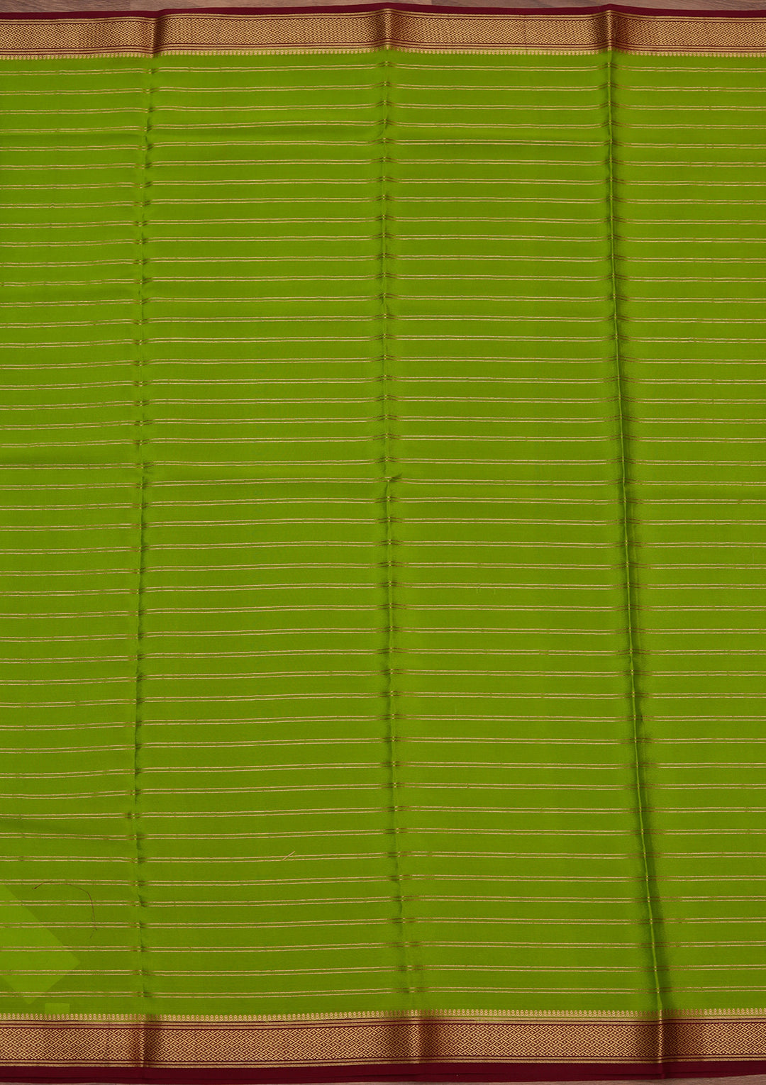 Parrot Green Crepe Stripes Saree With Matching Blouse Piece