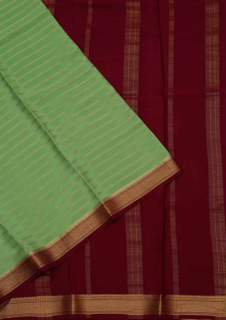 Pista Green Crepe Stripes Saree With Matching Blouse Piece