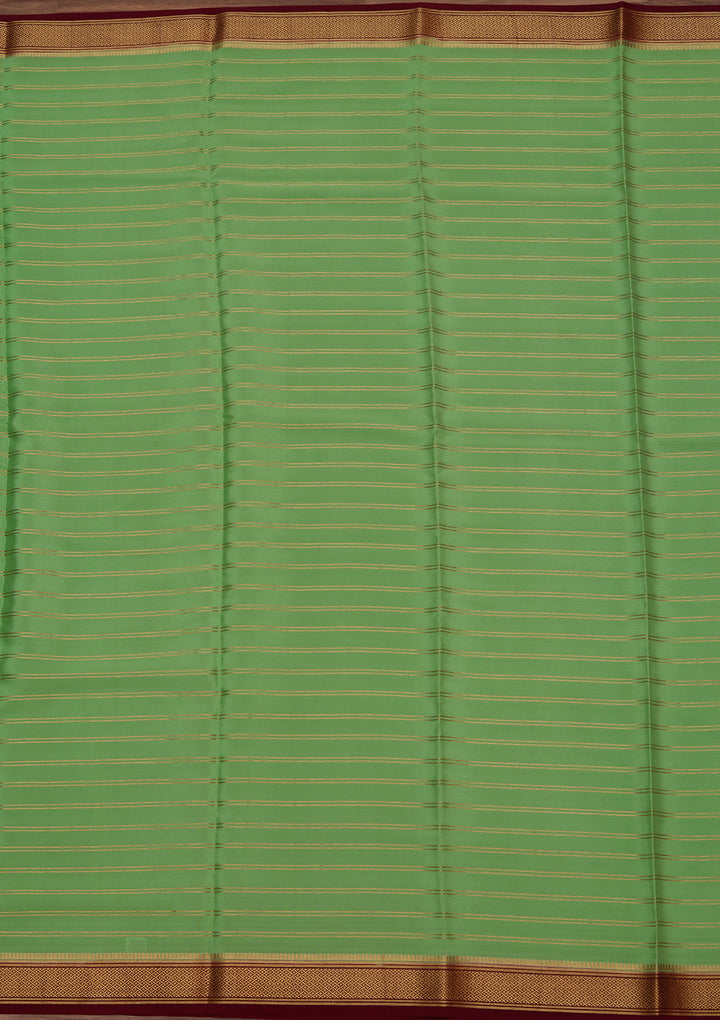 Pista Green Crepe Stripes Saree With Matching Blouse Piece