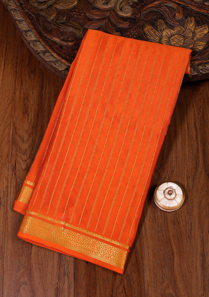 Orange Crepe Stripes Saree With Matching Blouse Piece