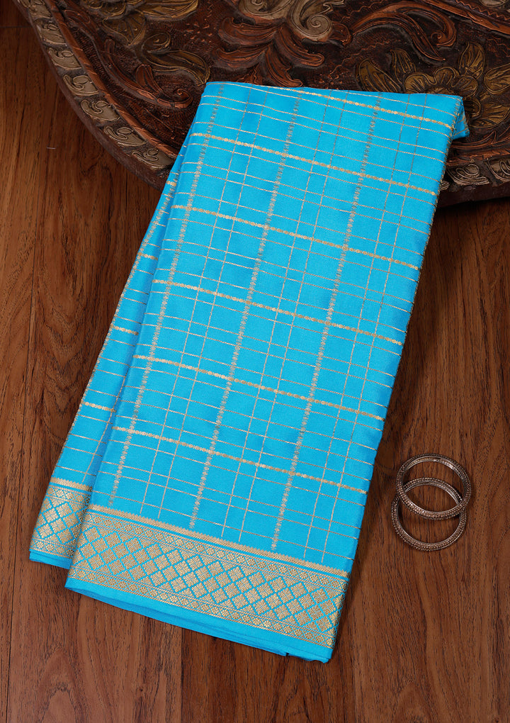 Blue Crepe Checks Saree With Matching Blouse Piece