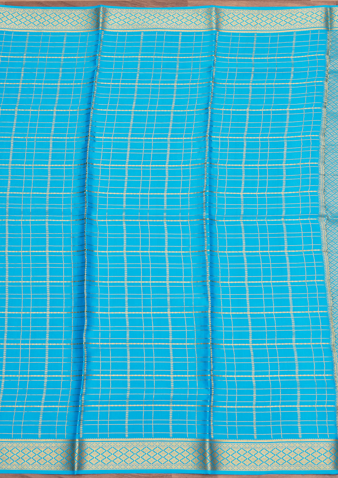 Blue Crepe Checks Saree With Matching Blouse Piece