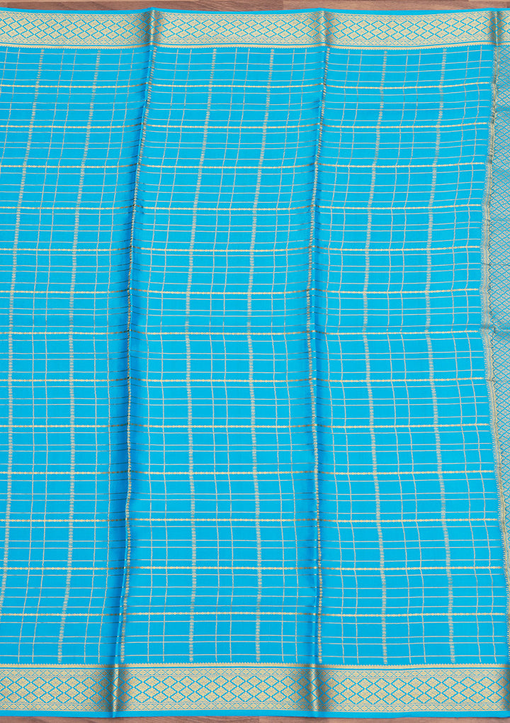 Blue Crepe Checks Saree With Matching Blouse Piece