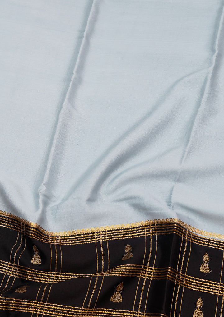 Sky Blue Crepe Checks Saree With Matching Blouse Piece
