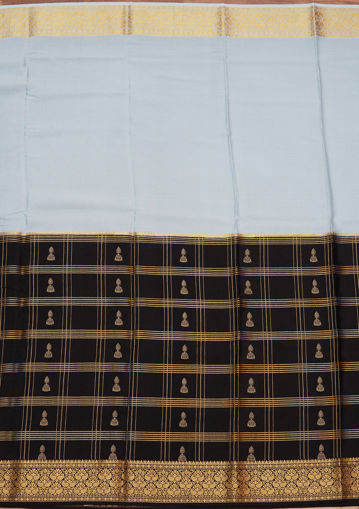 Sky Blue Crepe Checks Saree With Matching Blouse Piece