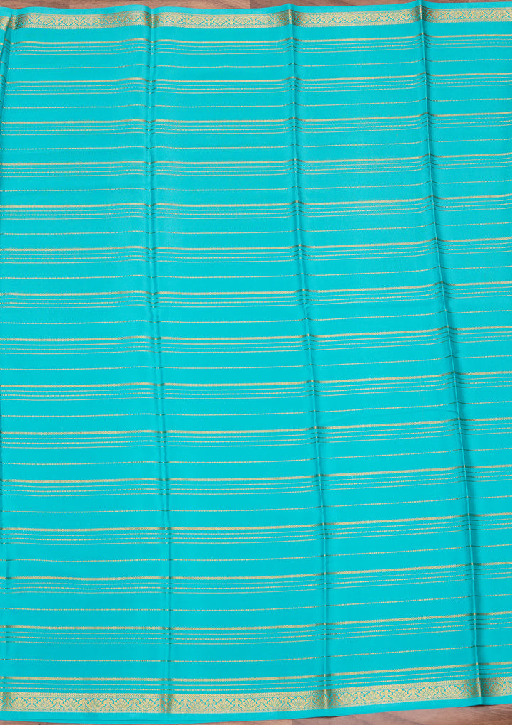 Sky Blue Crepe Stripes Saree With Matching Blouse Piece