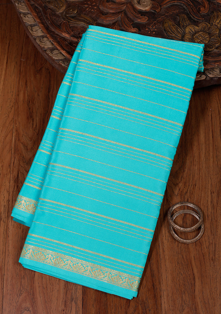 Sky Blue Crepe Stripes Saree With Matching Blouse Piece
