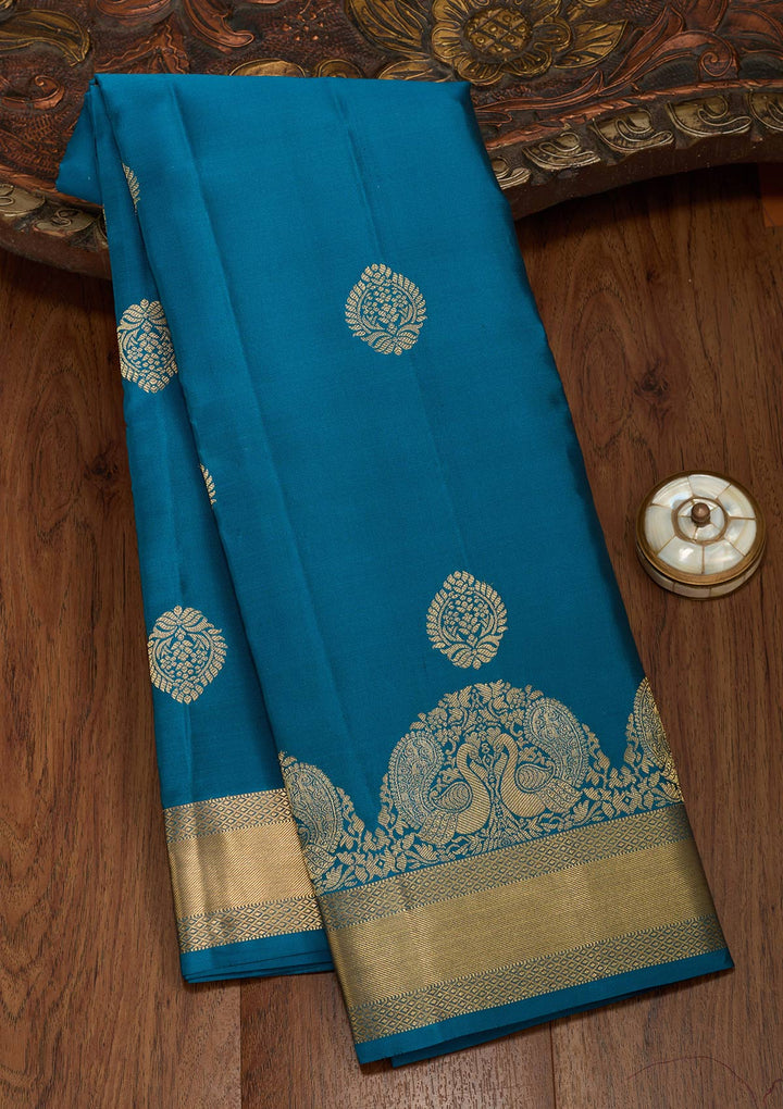 Peacock Blue Silk Buti Saree With Matching Blouse Piece