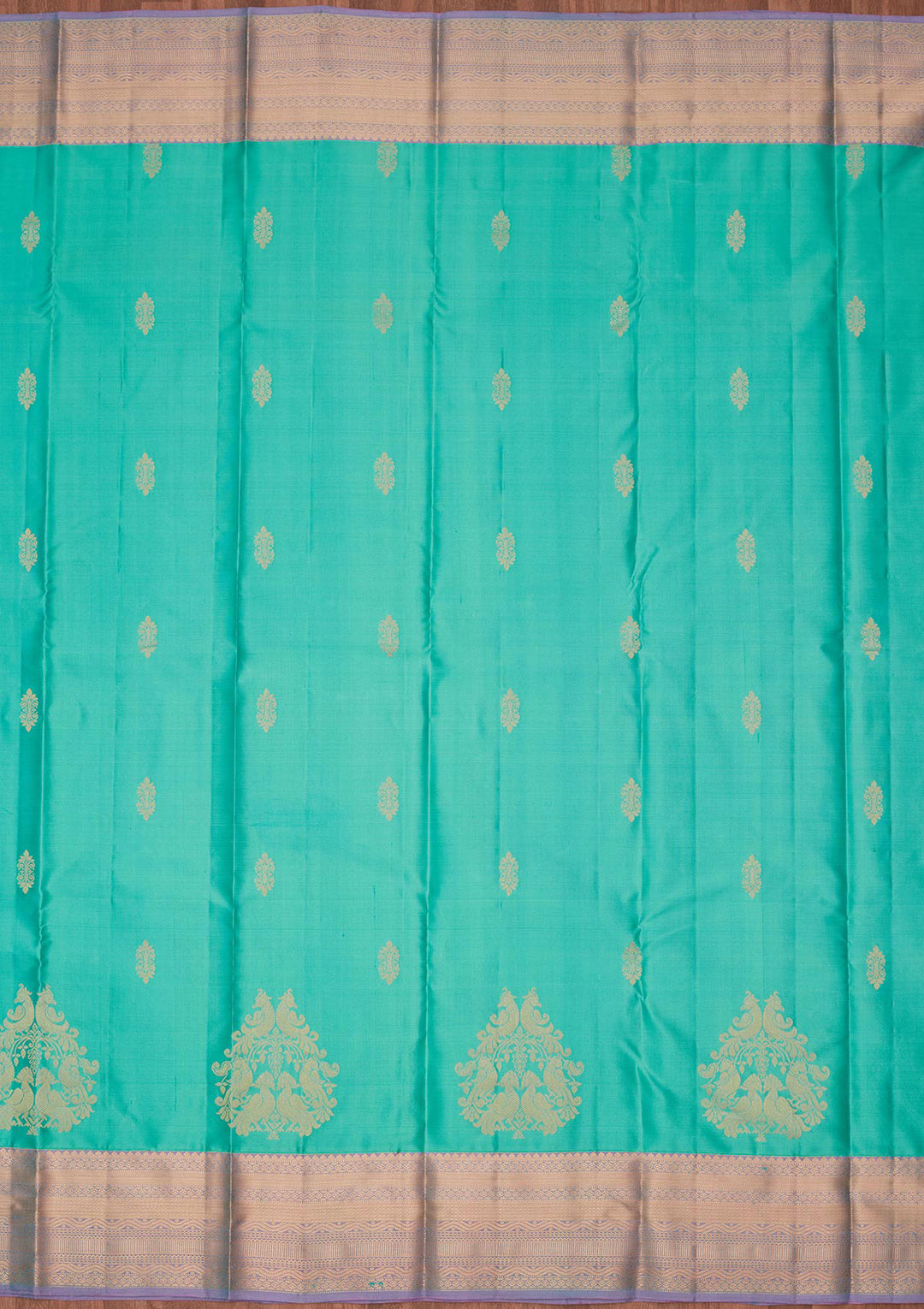 Sea Green Silk Buti Saree With Matching Blouse Piece