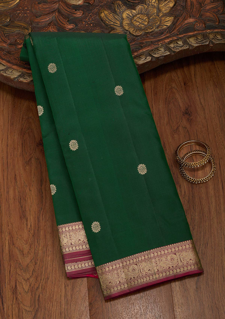 Bottle Green Silk Buti Kanjivaram Saree With Matching Blouse Piece