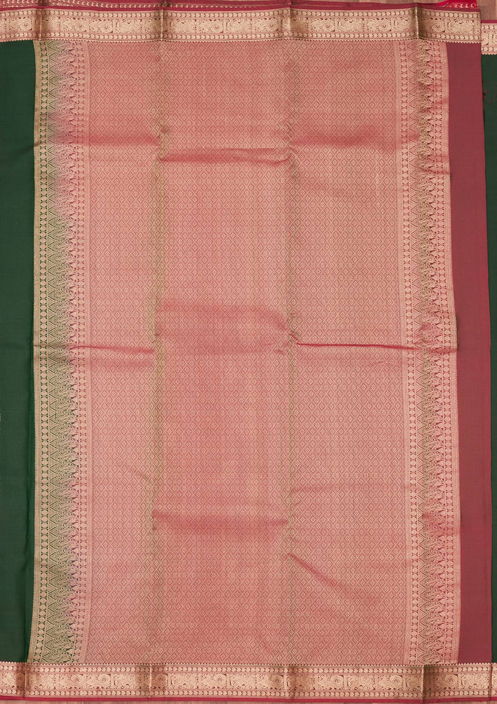 Bottle Green Silk Buti Kanjivaram Saree With Matching Blouse Piece