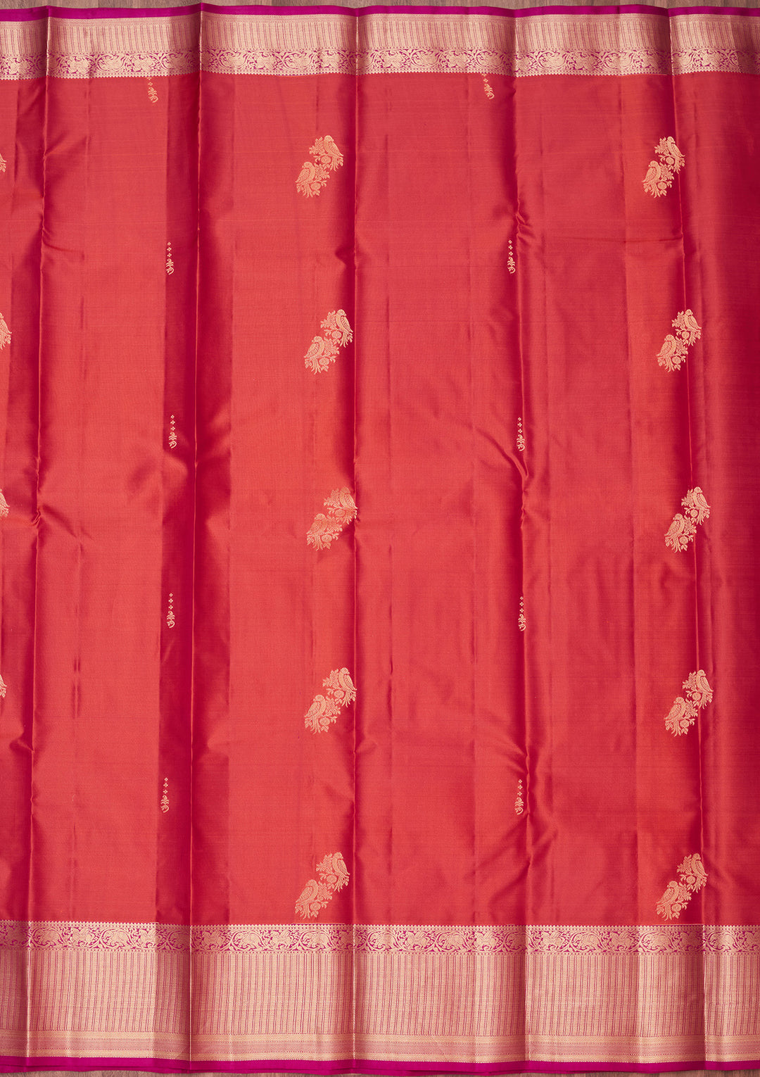 Rust Silk Buti Saree With Matching Blouse Piece