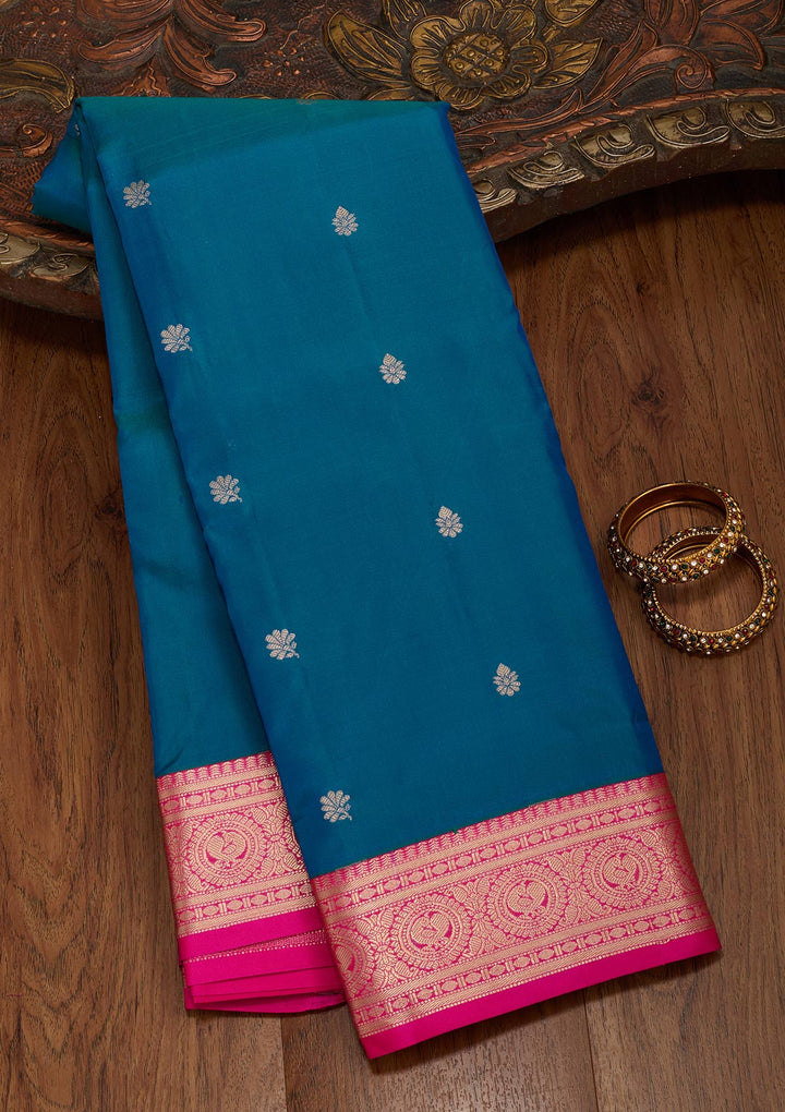 Peacock Blue Silk Buti Saree With Matching Blouse Piece