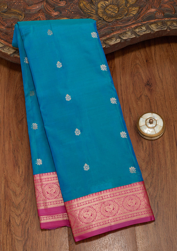 Turquoise Blue Silk Buti Saree With Matching Blouse Piece