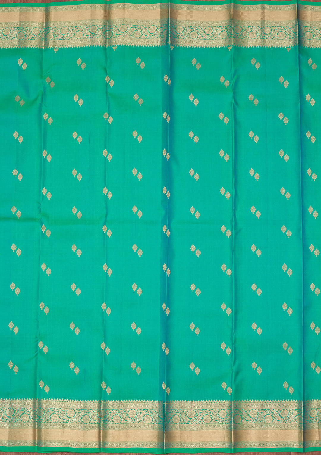 Sea Green Silk Buti Saree With Matching Blouse Piece
