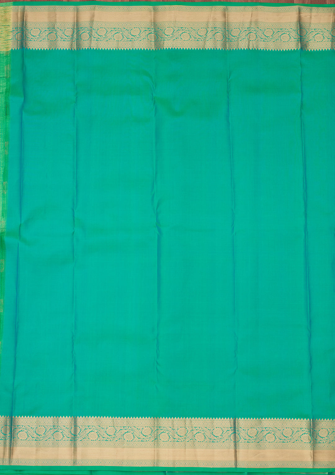 Sea Green Silk Buti Saree With Matching Blouse Piece