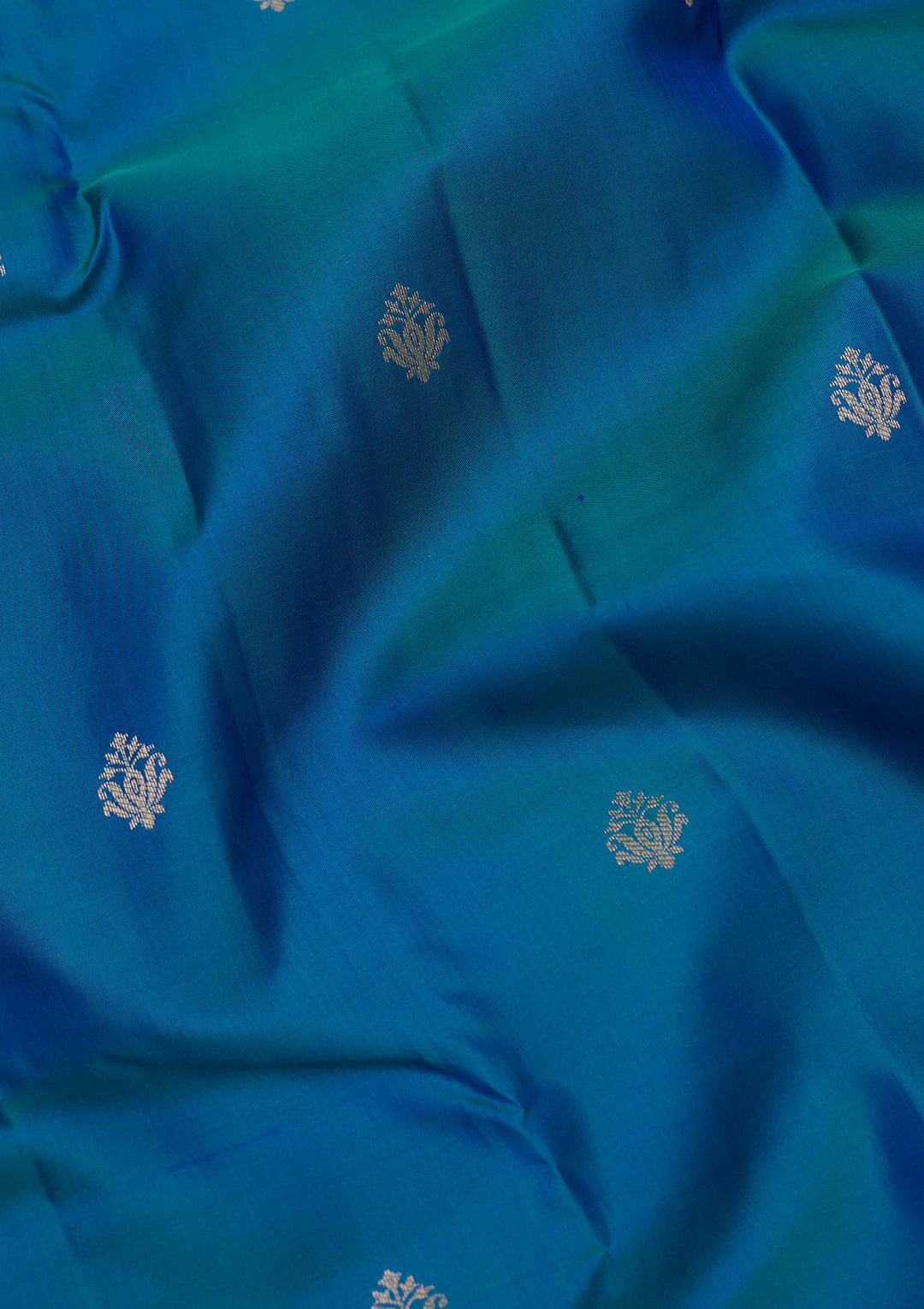 Peacock Blue Silk Buti Gold Zariwork Saree With Matching Blouse Piece