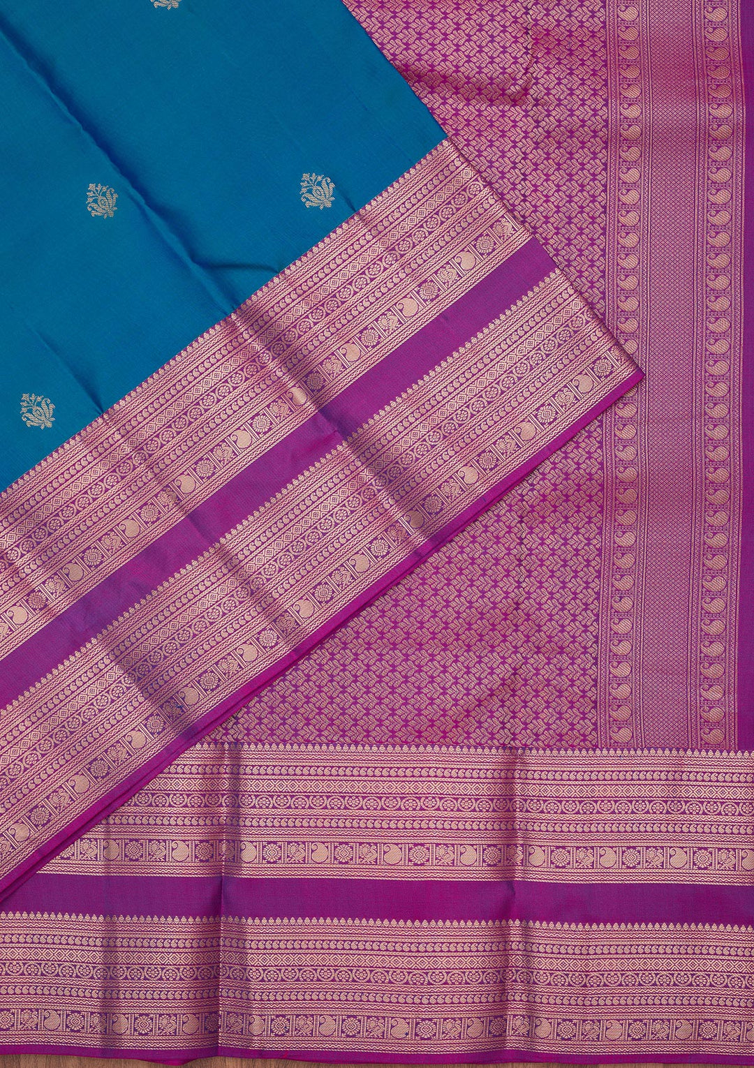 Peacock Blue Silk Buti Gold Zariwork Saree With Matching Blouse Piece