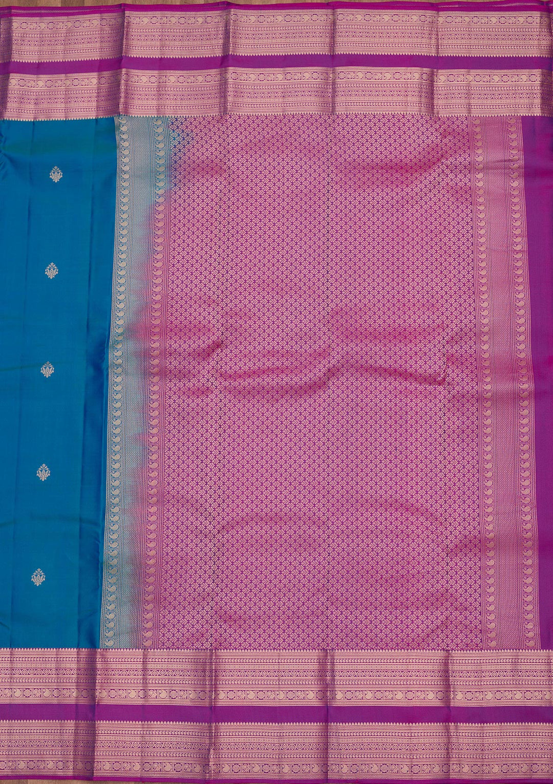 Peacock Blue Silk Buti Gold Zariwork Saree With Matching Blouse Piece
