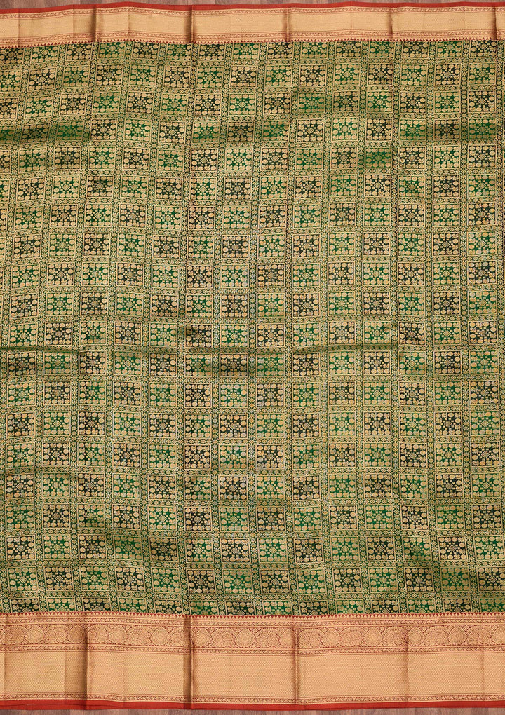 Bottle Green Silk Jaal Saree With Matching Blouse Piece