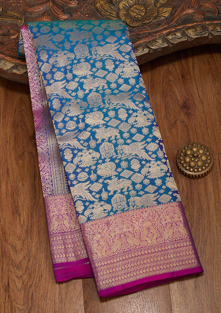 Peacock Blue Silk Jaal Saree With Matching Blouse Piece