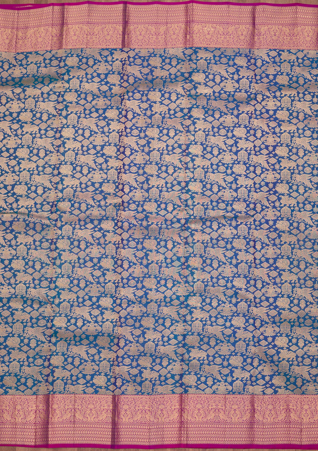 Peacock Blue Silk Jaal Saree With Matching Blouse Piece